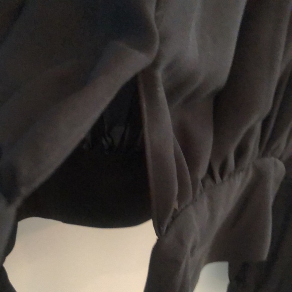 Frame sheer top with elastic detail around the yoke area. Black - Picture 5 of 6